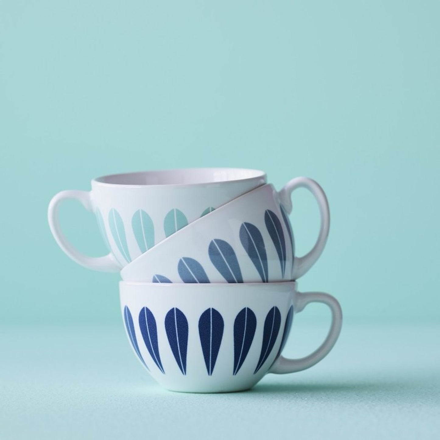 Lotus Cup And Saucer White And Grey By Lucie Kaas